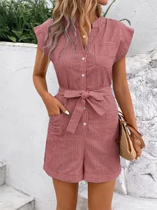 Detail showing the button-down front, collar, and waist tie on the striped romper