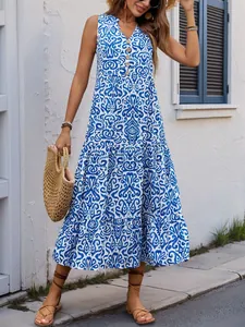 Bohemian V-neck sleeveless maxi dress with blue floral print and button detail