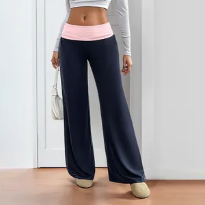 Navy blue low waist wide leg pants with pink contrast waist fold detail for women