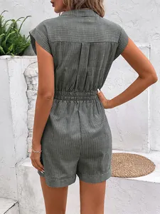 Detailed back view of green striped short romper featuring elastic waist and turn-up sleeves