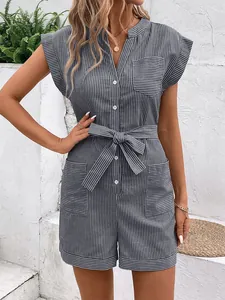 Detail of grey pinstripe romper with front buttons and large utility pockets