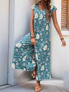 Detail of teal bohemian floral jumpsuit with sleeveless crew neck and wide leg design