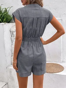 Detailed back view of a navy blue pinstripe short sleeve romper with elastic waist