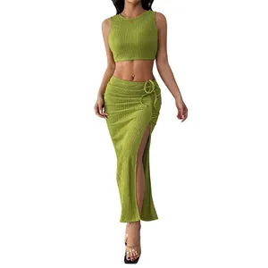 Women's 2-piece green ribbed knit set with sleeveless crop top and slit maxi skirt