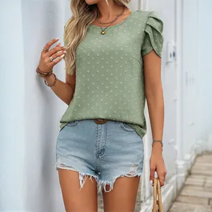 Sage green short sleeve puff sleeve top with textured swiss dots and classic crew neck