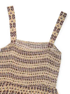 Detail of smocking elastic chest design with geometric diamond print on summer dress