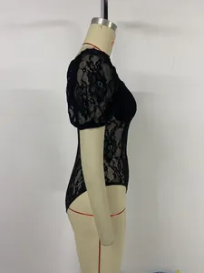 Detail of floral lace bodysuit featuring sheer short sleeves and a square neckline