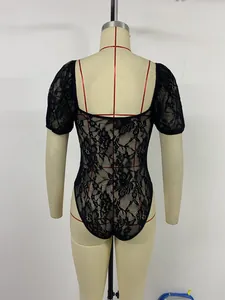 Close-up of black floral lace bodysuit featuring puff short sleeves and square neckline