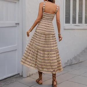 Bohemian geometric print tiered midi sundress with smocked back and spaghetti straps