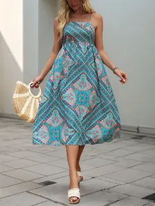Ethnic print maxi dress for women with blue geometric patterns and spaghetti straps