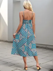 Blue ethnic floral print midi dress with thin straps and elastic back Smocked detail