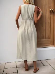 Elegant sleeveless beige midi dress with elastic waist and textured crinkle fabric back view
