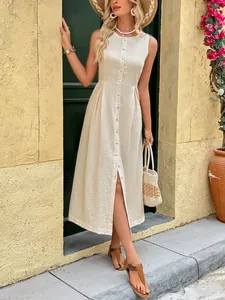 Detail of premium beige sleeveless dress featuring a full button-down front and linen texture