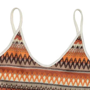 Detail of bohemian crochet knit texture and multicolor wavy pattern on the summer dress