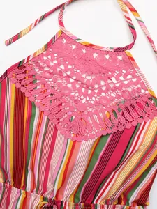 Detailed view of colorful vertical stripes with pink crochet lace trim on halter neck dress