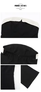 Detail showing high-quality stitching on black and white contrast tube jumpsuit with hidden zipper