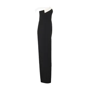 Side view detail of a strapless jumpsuit featuring a chic black and white fold-over neckline
