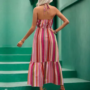 Sleeveless halter maxi dress with colorful vertical stripes and ruffled hem detail