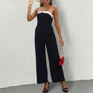 Elegant black strapless jumpsuit for women with white contrast trim and wide-leg design
