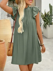 Sage green pleated mini dress with ruffle sleeveless design and elegant stand collar detail