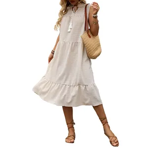 Abito estivo beige senza maniche a balze con scollo a V e lacci con nappe