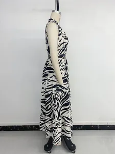 Detail view of the zebra print maxi dress featuring sleeveless design and elastic waist