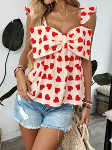 Sweet pink sleeveless top with red hearts, large bow, and ruffled sleeves for summer