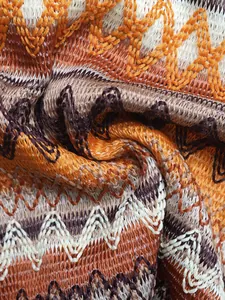 Macro detail of multi-color zigzag knit fabric texture on the summer vacation outfit