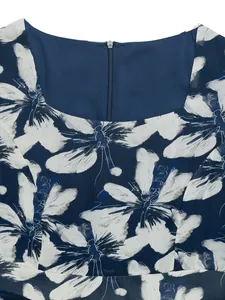 Detail of square neckline and back zipper on navy floral print summer dress