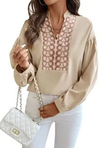 Elegant beige stand collar long sleeve shirt with pink chain link pattern and lantern sleeves