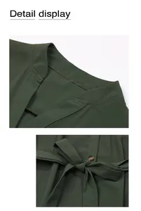 Detailweergave van een donkergroene jurk met V-hals kraag en strikje in de taille