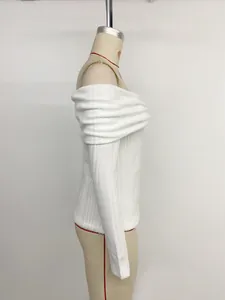 Close-up of ribbed texture and off-shoulder folded collar on white slim knit top