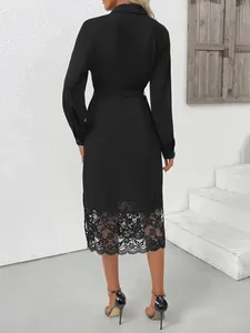 Elegant black long-sleeve midi dress with exquisite lace hem and waist tie back view