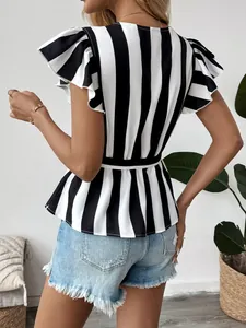 Rear view of black and white striped peplum top featuring elegant ruffled sleeves