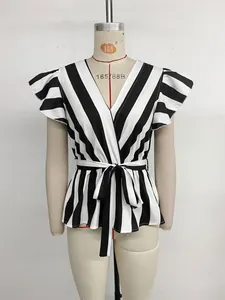 Detail view of V-neck striped shirt featuring ruffle sleeves and adjustable waist tie belt