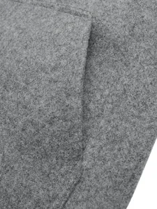Close-up detail of grey wool jacket texture and precise stitching on the pocket seam