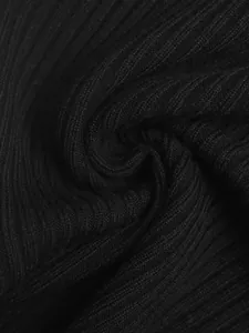 Close-up of black ribbed knit fabric showing soft texture and vertical stripe pattern