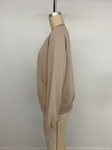 Detail view of the ribbed cuffs and side pocket stitching on this khaki casual jacket