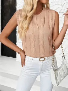 Detailed view of women's cable knit vest featuring classic crew neck and ribbed armholes