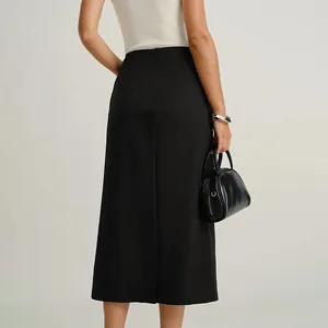 Elegant black straight midi skirt with vintage front slit and slim fit for autumn wear