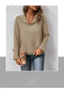 Detail of khaki quilted long sleeve sweatshirt with turn-down collar and large pocket
