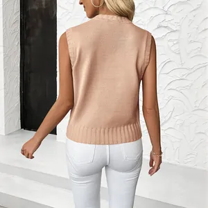 Peach pink sleeveless cable knit sweater vest with ribbed crew neck and hem