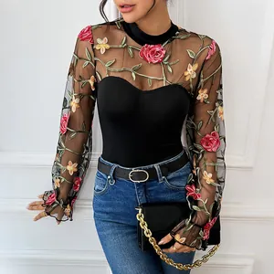 Slim fit bodysuit with floral embroidery on sheer mesh sleeves and mock turtleneck