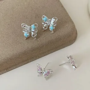 Eleganti orecchini a farfalla con stella blu e zircone rosa in finitura argento