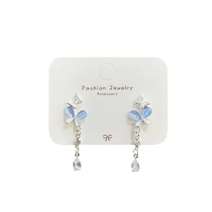 Silver butterfly earrings with pink and blue cat eye stone and long tassel pendants