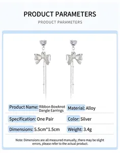 Detail specifications of silver bow earrings with long tassels and heart studs