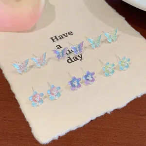 Lot de 6 paires de boucles d'oreilles papillon et fleur avec perles nacrées