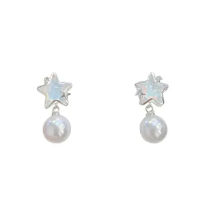 Star-shaped earrings with micro-inlaid rhinestones and white round pearls in silver