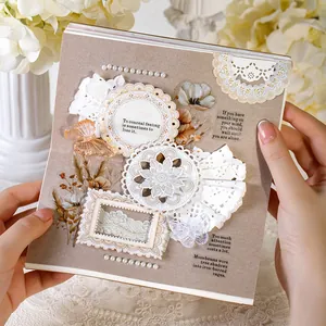 Vintage lace scrapbooking kit with butterfly stickers and floral DIY paper materials