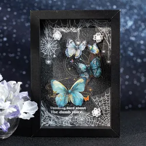 Sparkling butterfly masking tape for scrapbooking with vintage blue moth and spiderweb patterns